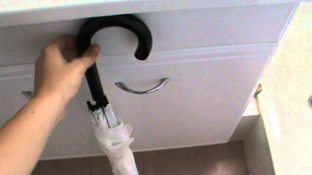 HowToBasic's tweet card. How To Pick Up a Umbrella