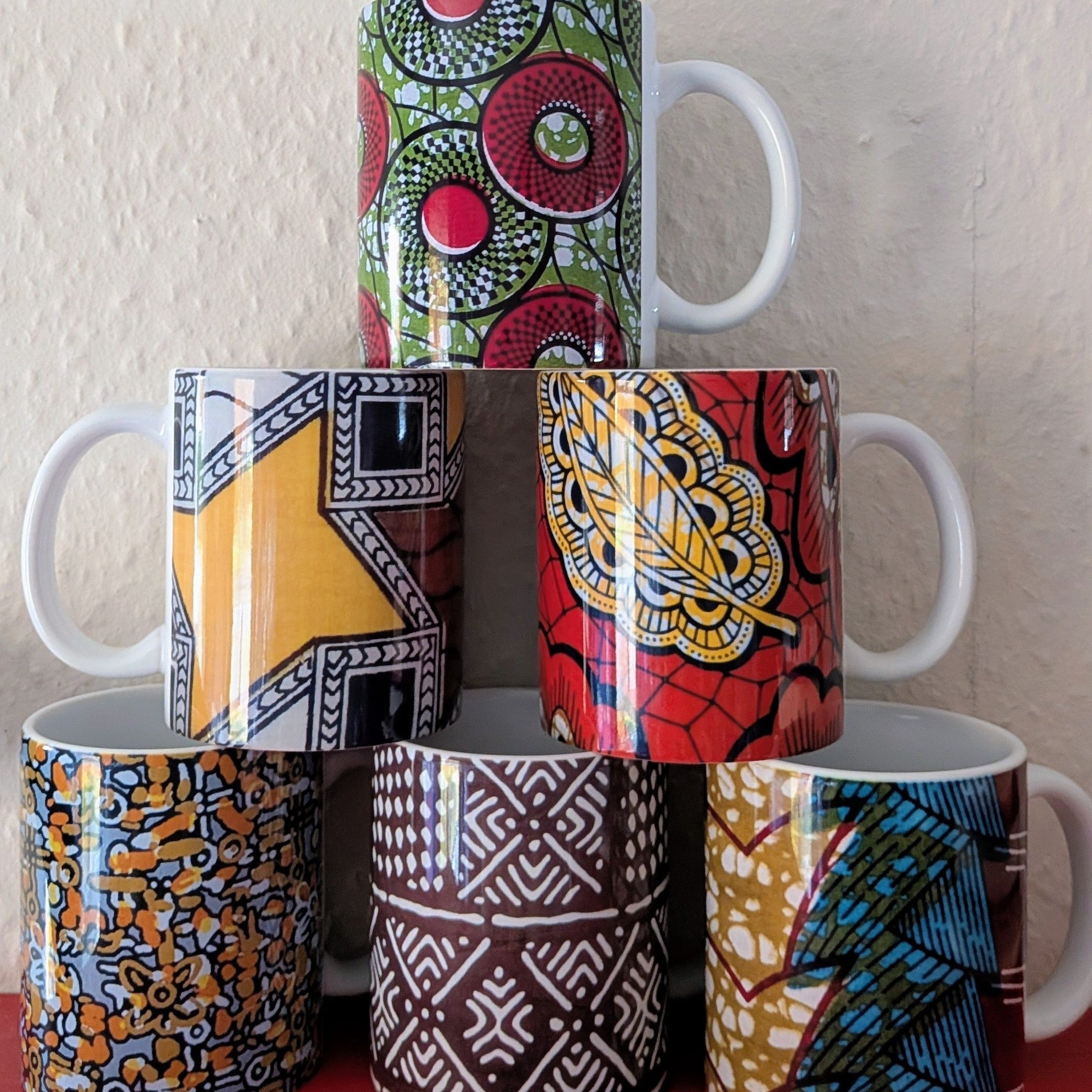 DetolaAndGeek's tweet card. Enjoy sipping a hot/cold drink from one of my colourful African patterned ceramic mugs. 