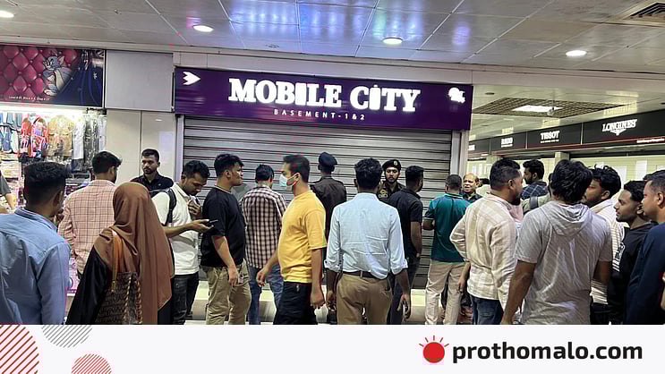 ProthomAlo's tweet card. রাজধানীর ছোট-বড় সব মোবাইল মার্কেট বন্ধ থাকায় চরম দুর্ভোগে পড়েছেন দূরদূরান্ত থেকে আসা ক্রেতারা।
