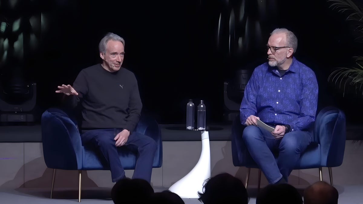 empirecafeug's tweet card. Linux's leader, Linus Torvalds, and his friend, Dirk Hohndel, discuss AI, Rust, and Linux's human side.