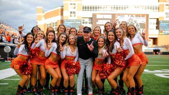 FootballScoop's tweet card. Oklahoma State has fired Mike Gundy.