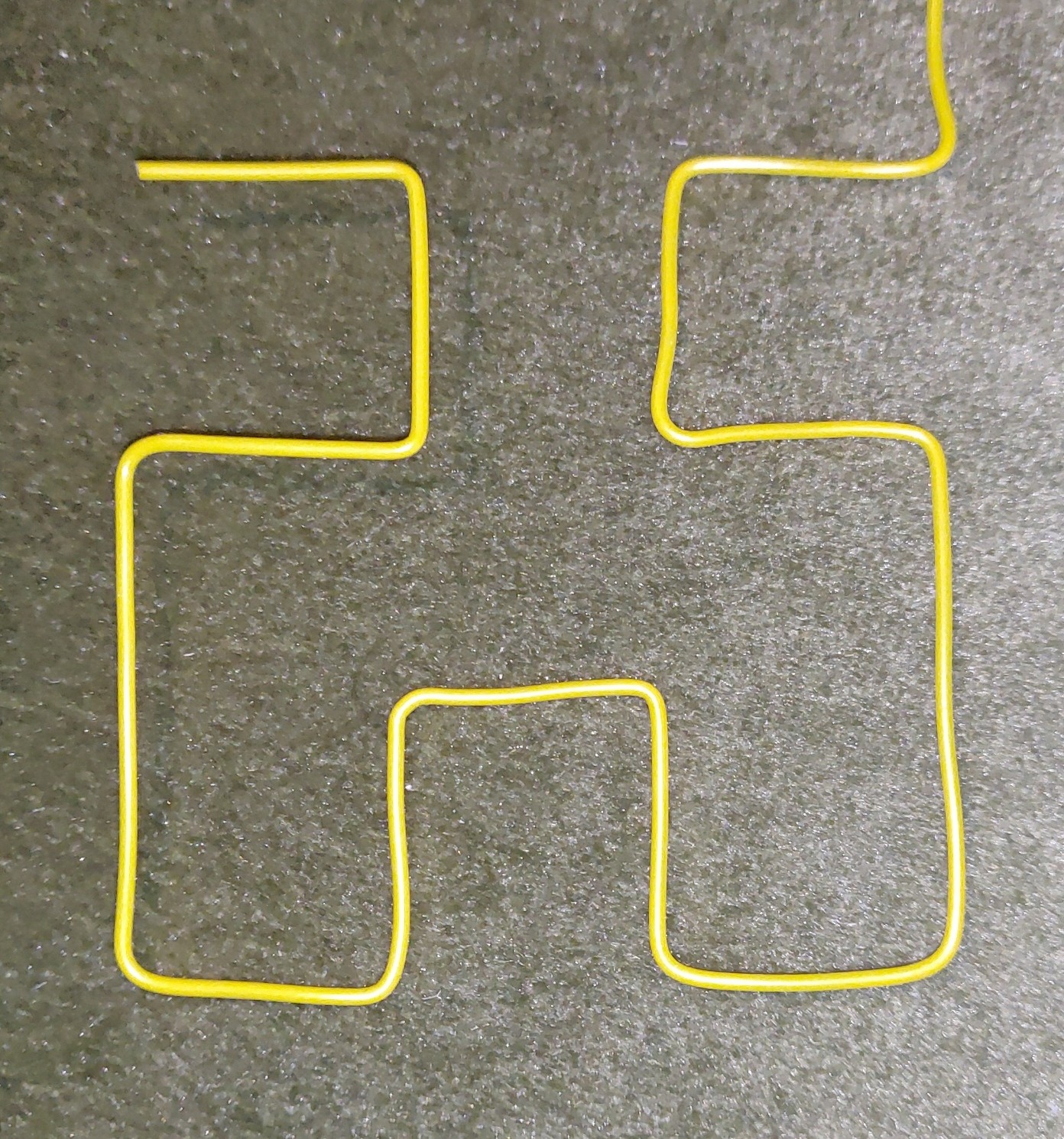 PartFusion's tweet card. Attached: 1 image #Makevember 24: Made a second order Hilbert space-filling curve out of some yellow wire.