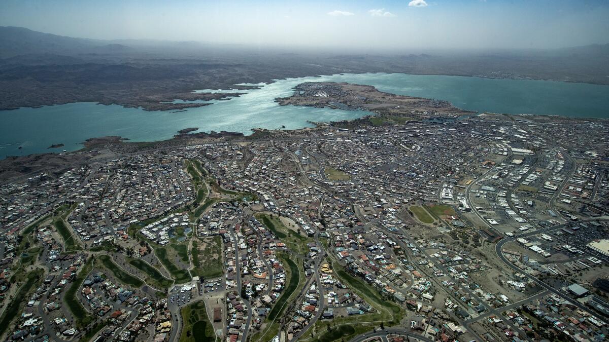 latimes's tweet card. More Californians move into Arizona each year than any other state but Texas. In Lake Havasu City, two people arrive from California for each Arizonan who moves there.