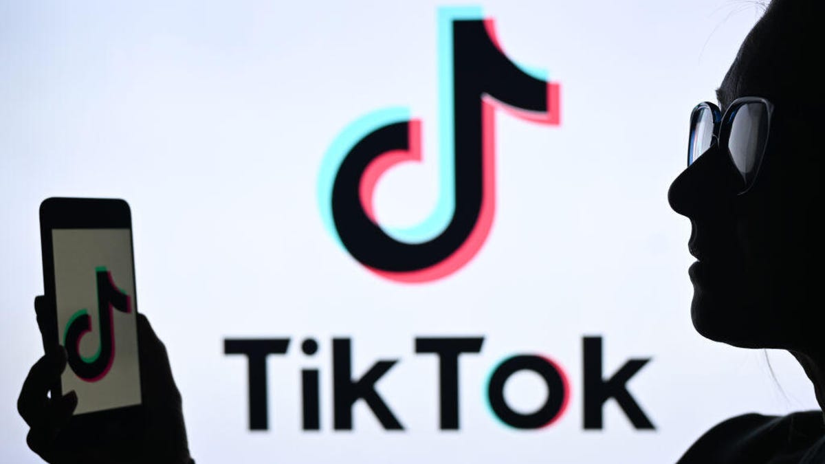 CNET's tweet card. The social media video platform is also working on improving labeling of AI-generated content.