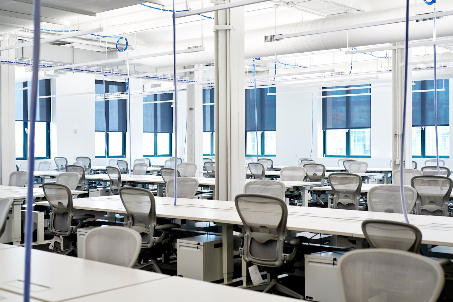 tom_peters's tweet card. Offices will never be the social hubs they once were. It’s better this way.