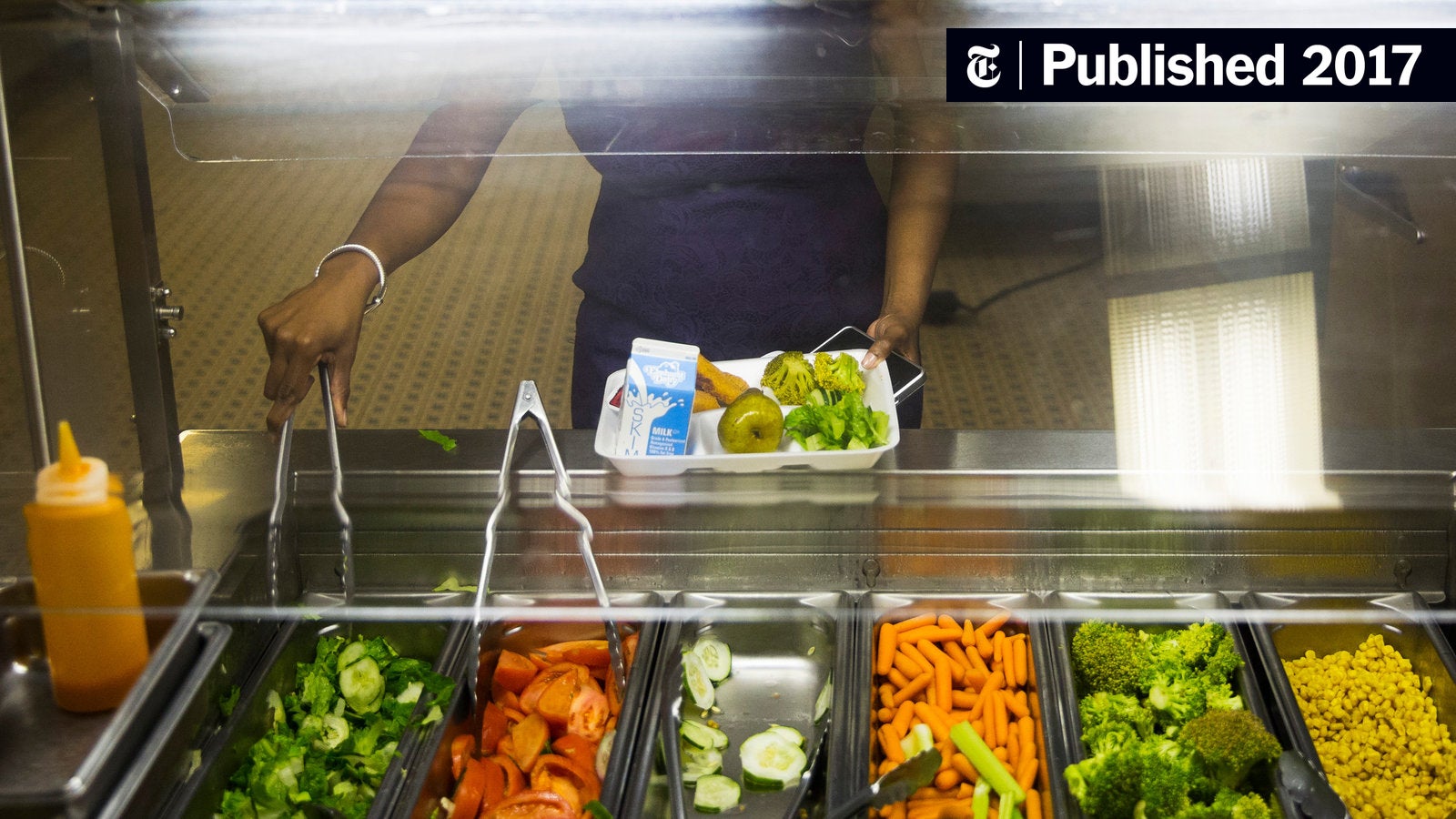 nytimes's tweet card. The city becomes the largest district in the country to feed all children free of charge, ending stigma for those who can’t afford to pay.