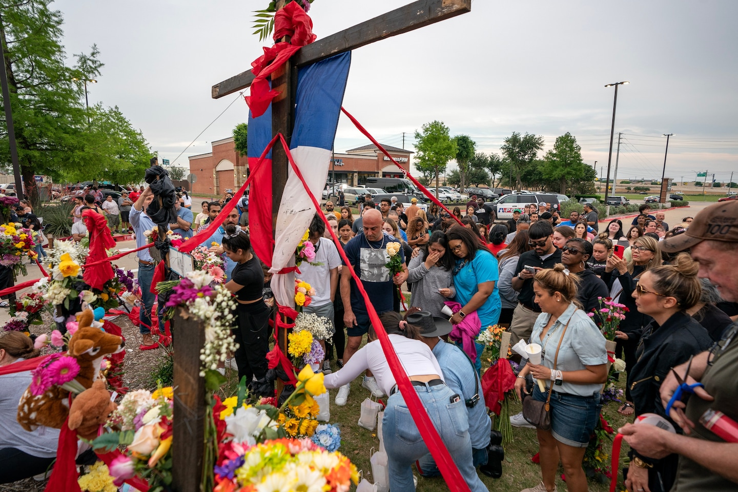 KarenAttiah's tweet card. At the Allen Premium Outlets, where I used to shop with my family, a gunman rains down death.