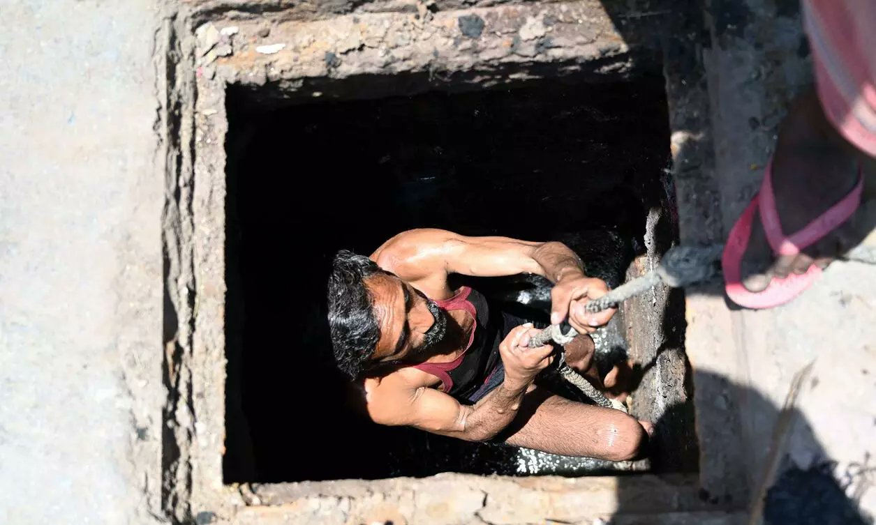 TheFederal_News's tweet card. Workers risk their lives on daily basis while cleaning sewers, manholes, and fixing leakages, while the call for basic infrastructure, safety gears, and equipment goes unheeded