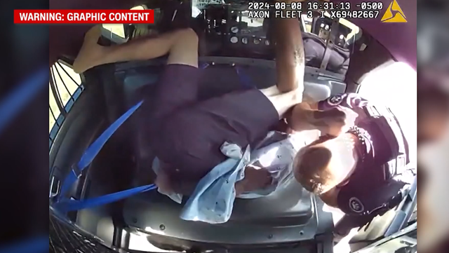 adamcallroberts's tweet card. Video from the back of the patrol car showed the officer punching and elbowing the victim in the face. It also showed him slamming the car door on his head.