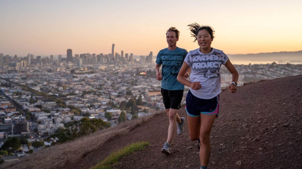 iRunFar's tweet card. A profile of global fitness community November Project.