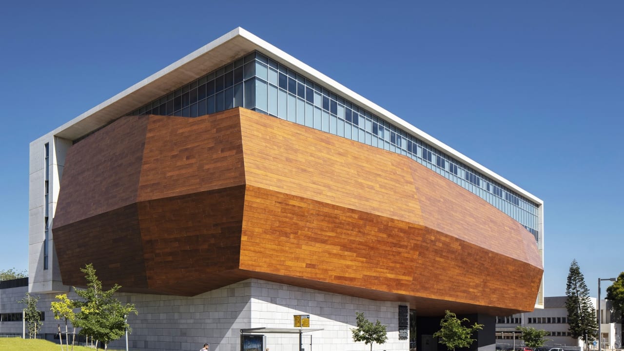 Jerusalem_Post's tweet card. The exhibition spans 40 projects, from urban planning to interiors, and is intentionally integrated into their workspace.