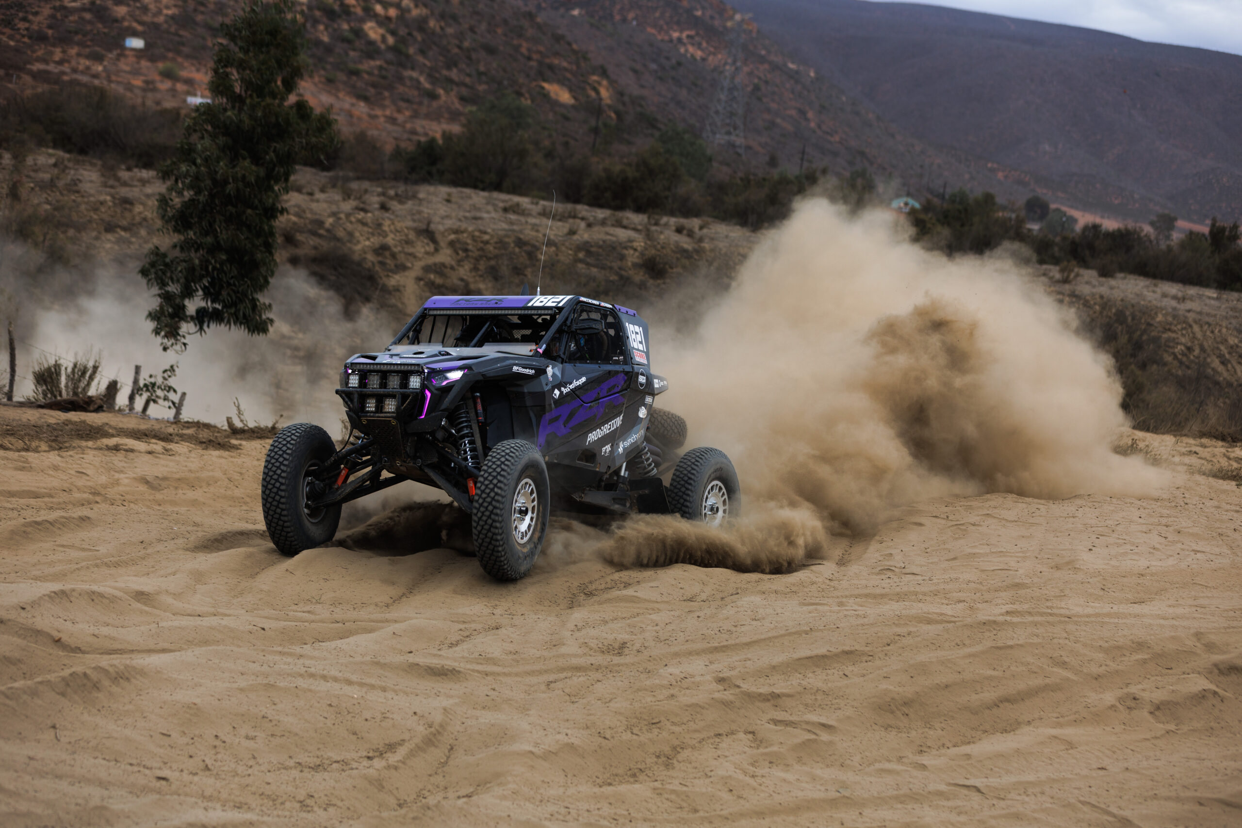UTVGuide's tweet card. Cayden MacCachren’s relentless performance shines at the Baja 1000, securing a celebrated win for Polaris RZR Factory Racing.
