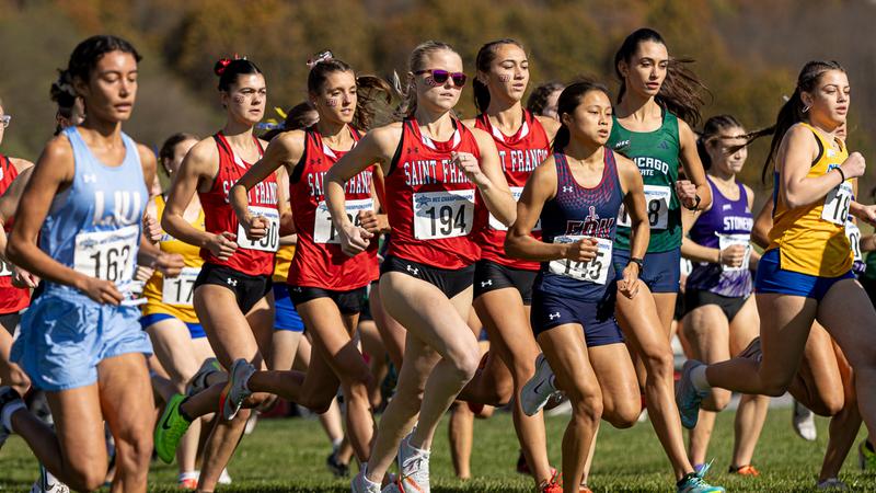 RedFlashXCTF's tweet card. Balance, discipline, drive - three words that define Anna Quackenbush.