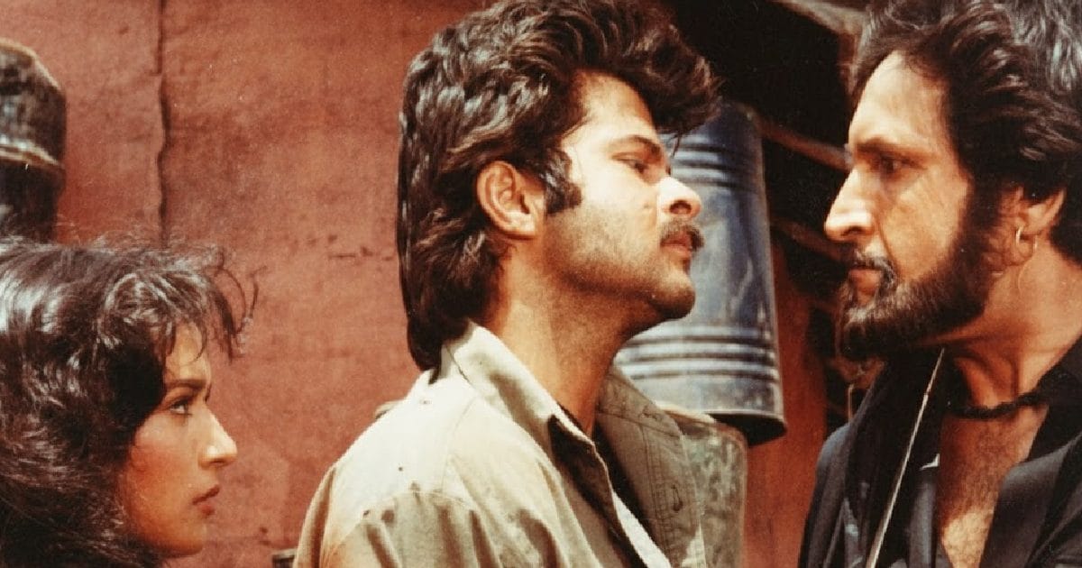 amitesh0's tweet card. 7 Highest Grossing Films Of 1988: साल 1988 अनिल कपूर के लिए काफी लकी साबित हुआ था, क्योंकि इसी साल उन्होंने अपने करियर की सबसे बेहतरीन फिल्म बॉक्स ऑफिस पर दी थी. अनिल कपूर की इस फिल्म का नाम था...