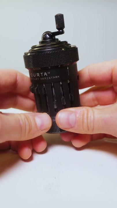 MacSmiley's tweet card. The Curta Mechanical Calculator