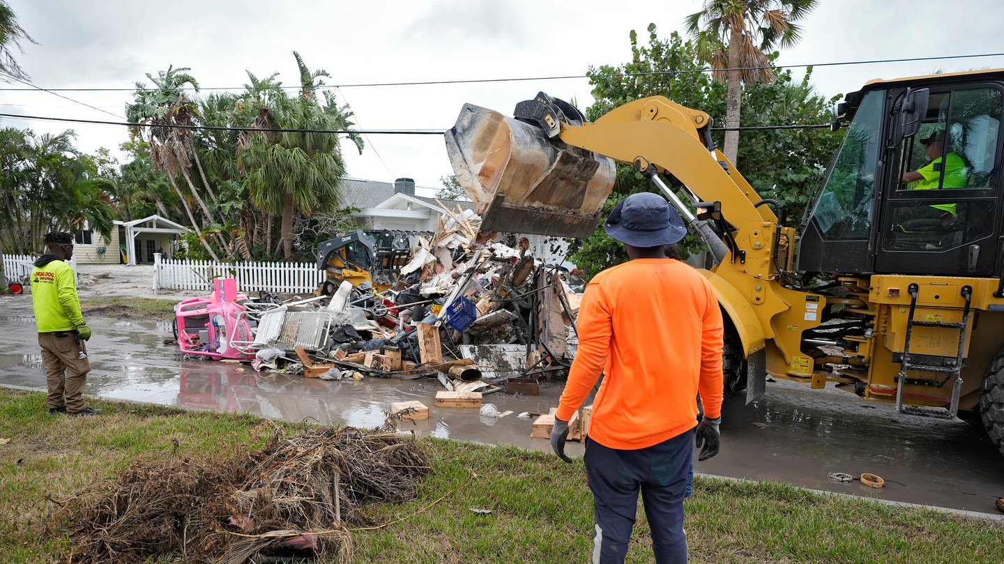 wabenews's tweet card. Updated at 6:49 p.m.  Florida’s storm-battered Gulf Coast raced against a Category 5 hurricane Monday as workers sprinted to pick up heaps of appliances and other street debris left over […]