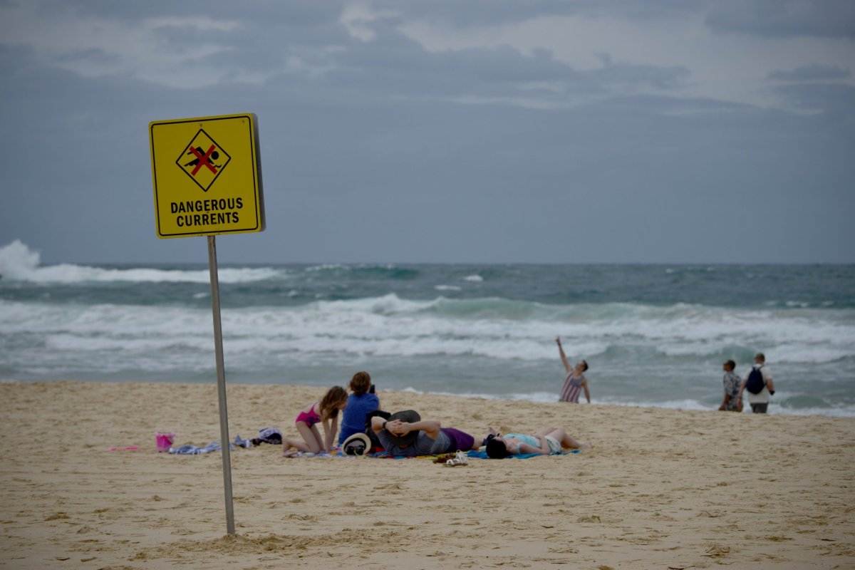 ai_construct's tweet card. The teenage swimmers were spotted 2,300 feet offshore.