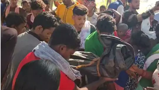 write2ragavan's tweet card. Family members and villagers gather in large numbers as grief grips Poovarti; Hidma was killed in an encounter in ASR district.