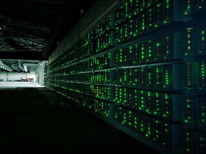 litigious_dulce's tweet card. The bitcoin miner will default on the loans tomorrow, unless it can reach a restructuring agreement with its lender.