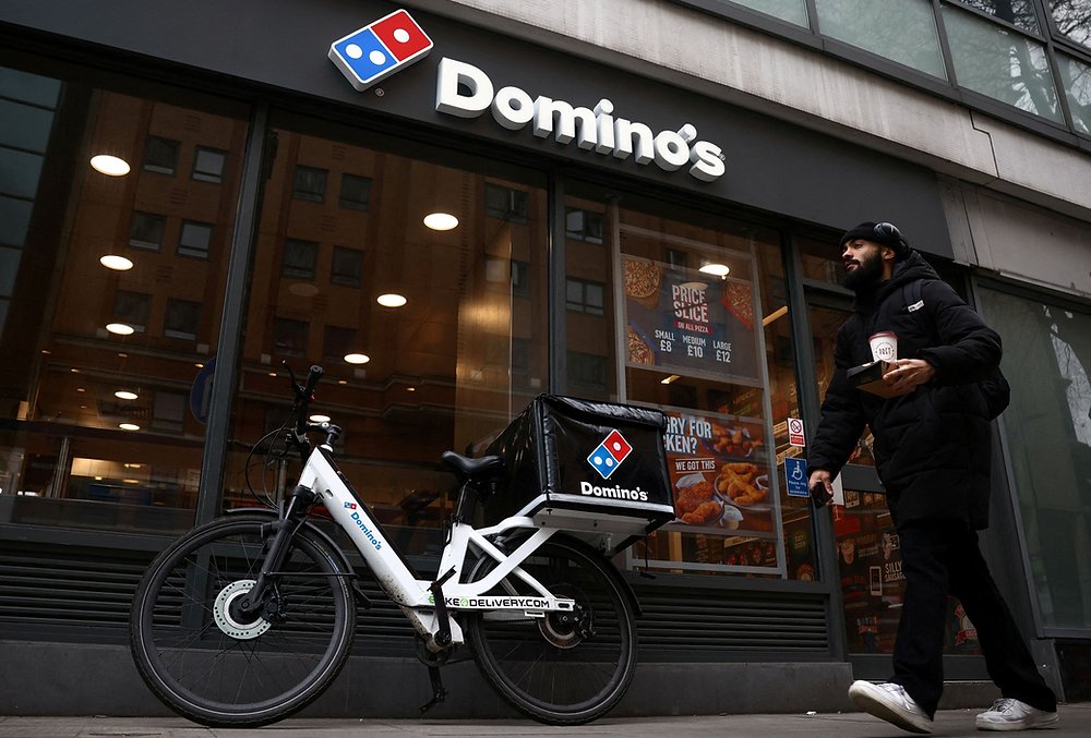 econouk's tweet card. Domino’s Pizza Group PLC said on Monday it would maintain its full-year 2025 targets and unveil a £20 million ($27m) share buyback plan after reporting resilient first-half trading. 