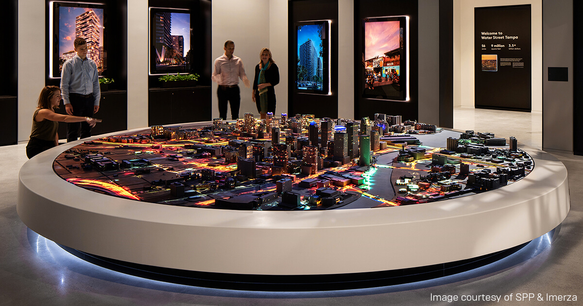 ProjectedFuture's tweet card. A 3D-printed scale model of downtown Tampa, projection mapping, and real-time technology combine to create a unique real estate marketing tool.