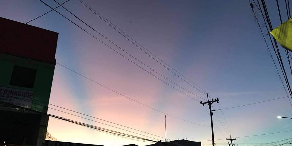 snowtaehh's tweet card. On my way to buy pandesal bread.. and captured this amazing sky.. 