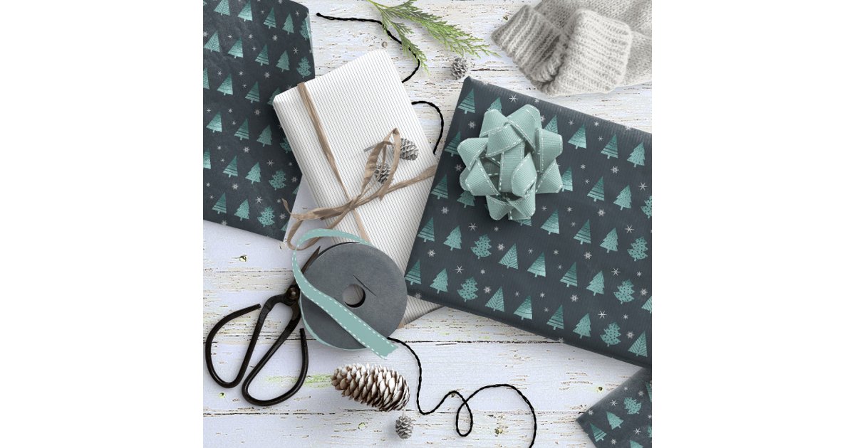 ArrayStores's tweet card. This gift wrap features a subtle pattern of stylized Christmas trees and snowflakes with a textured-effect in shades of watchet blue on a deep teal background. Search ID861 thru ID864 to see additi...