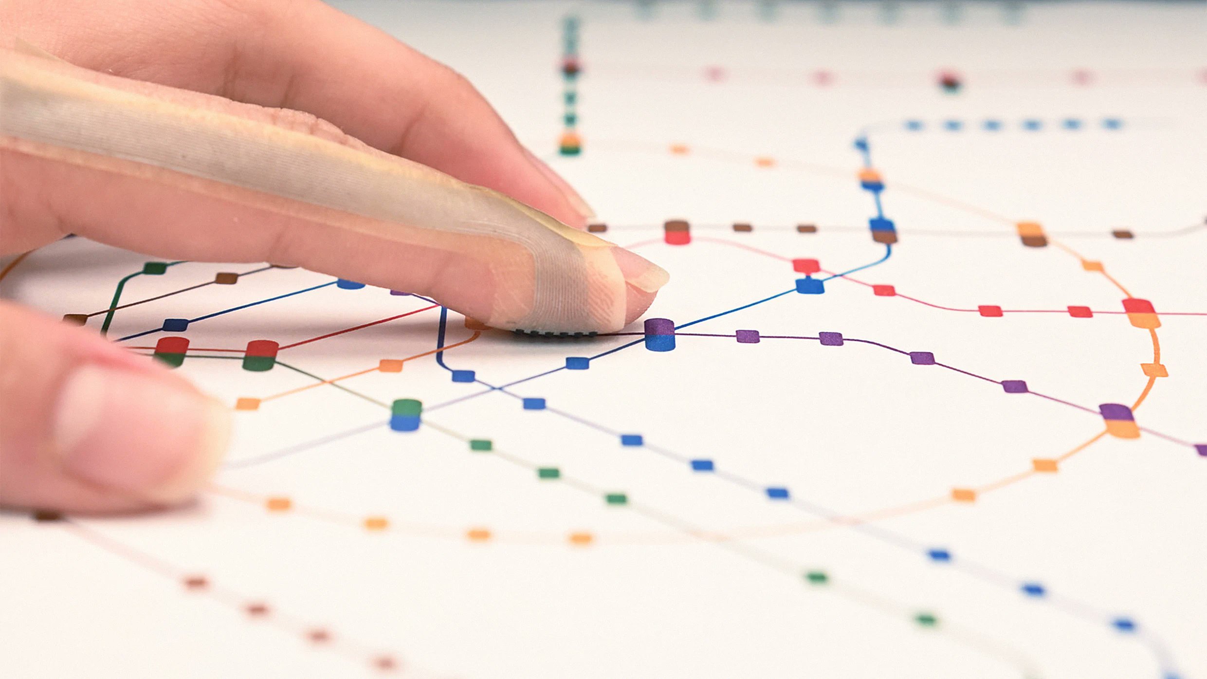 FastCoDesign's tweet card. The device is the first to achieve ‘human resolution,’ meaning it can begin to match the way your fingertip senses the world.