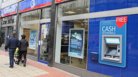 Finextra's tweet card. Nationwide has announced that it will continue to keep every one of its 696 Nationwide and Virgin Money branches open until at least 2030, despite many other banks closing theirs.
