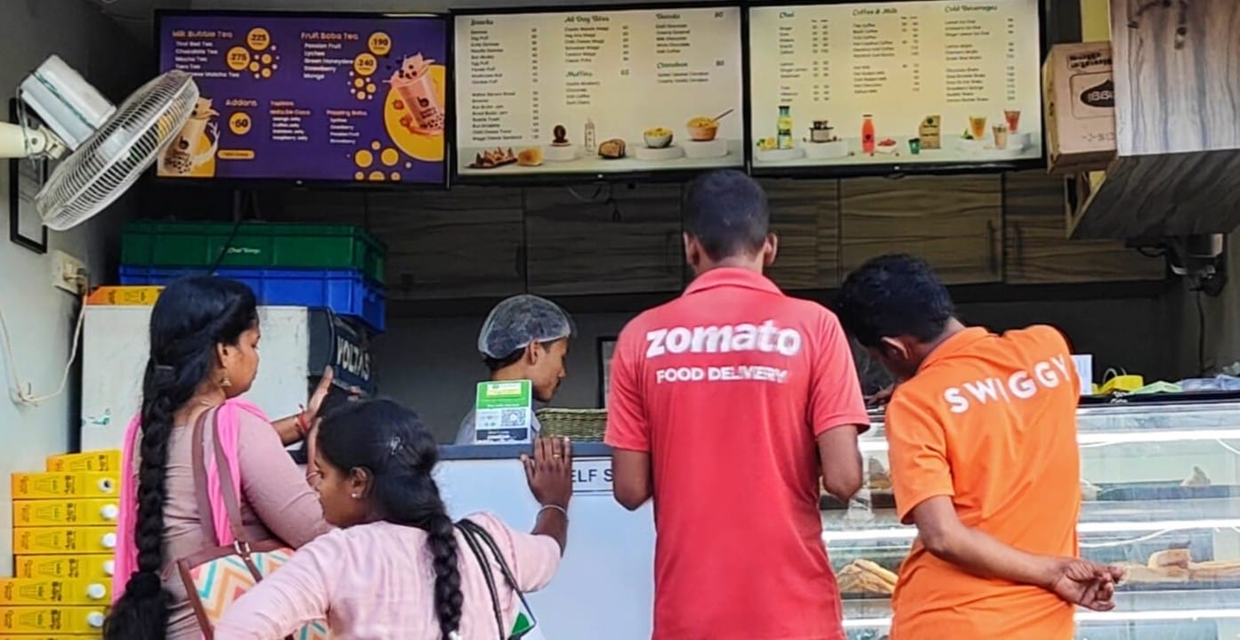 TGPWU's tweet card. Penalties for order cancellations, along with platform features like conditional health insurance, make delivery workers more vulnerable during rains.