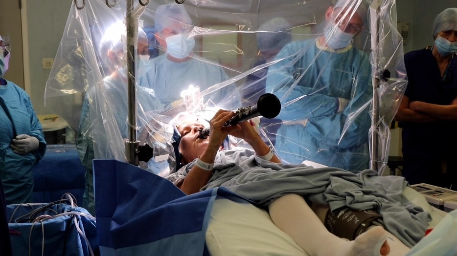 tc0888's tweet card. Doctors noticed an instant improvement in Parkinson’s disease patient Denise Bacon’s mobility during the procedure, known as Deep Brain Stimulation.