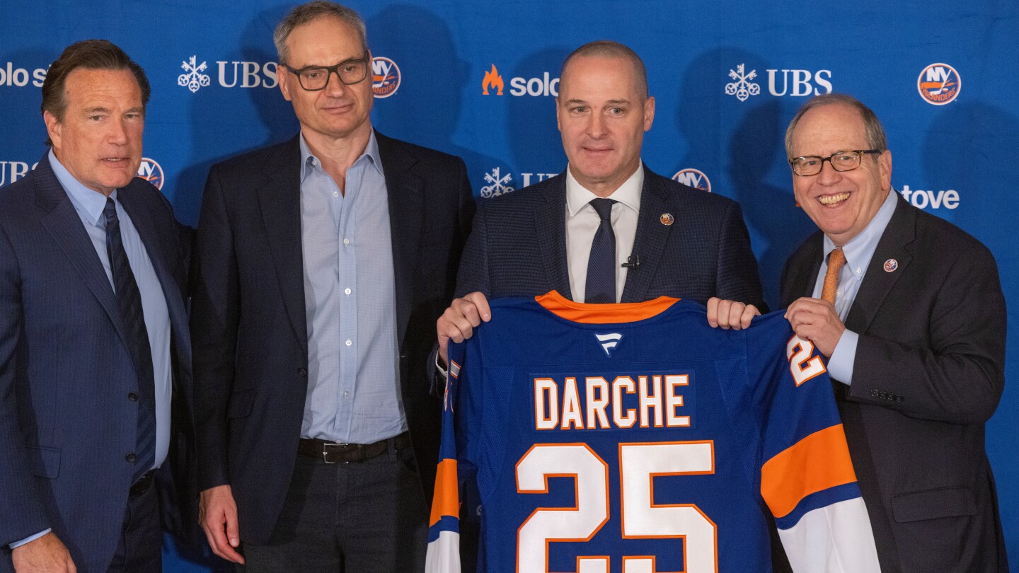 akreda's tweet card. Mathieu Darche was all smiles as he was formally introduced as the New York Islanders' executive vice president and general manager.