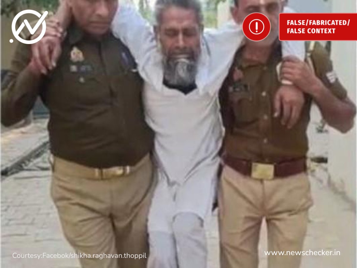 NewscheckerML's tweet card. “മദ്രസയിലെത്തിയ കുട്ടിയെ പീഡിപ്പിച്ച ഉസ്താദിനെ യുപി പൊലീസ് അറസ്റ്റ് ചെയ്തുകൊണ്ടുവരുന്ന ദൃശ്യം” എന്ന പേരിൽ ഒരു വീഡിയോ സമൂഹമാധ്യമങ്ങളിൽ പ്രചരിക്കുന്നു.