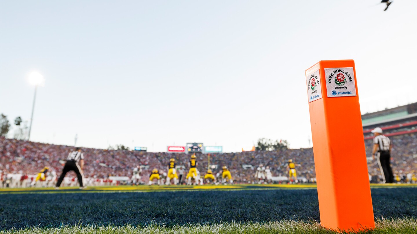 ProFootballTalk's tweet card. EA is bringing back the college football game.