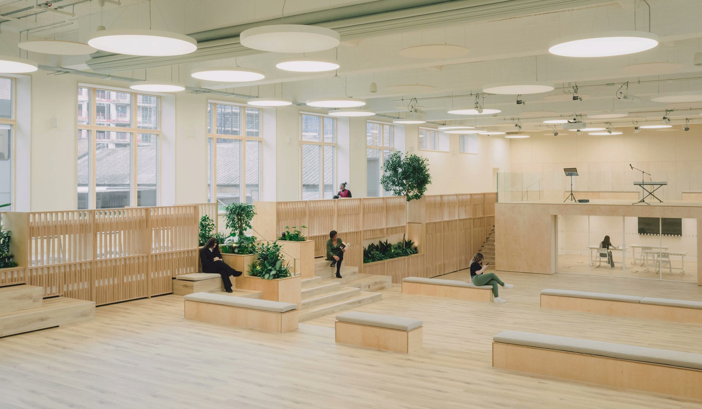 urdesignmag's tweet card. Studio Dera masterfully retrofits Waltham Forest College's disused pool into a light-filled, multifunctional teaching space using low embodied carbon design.