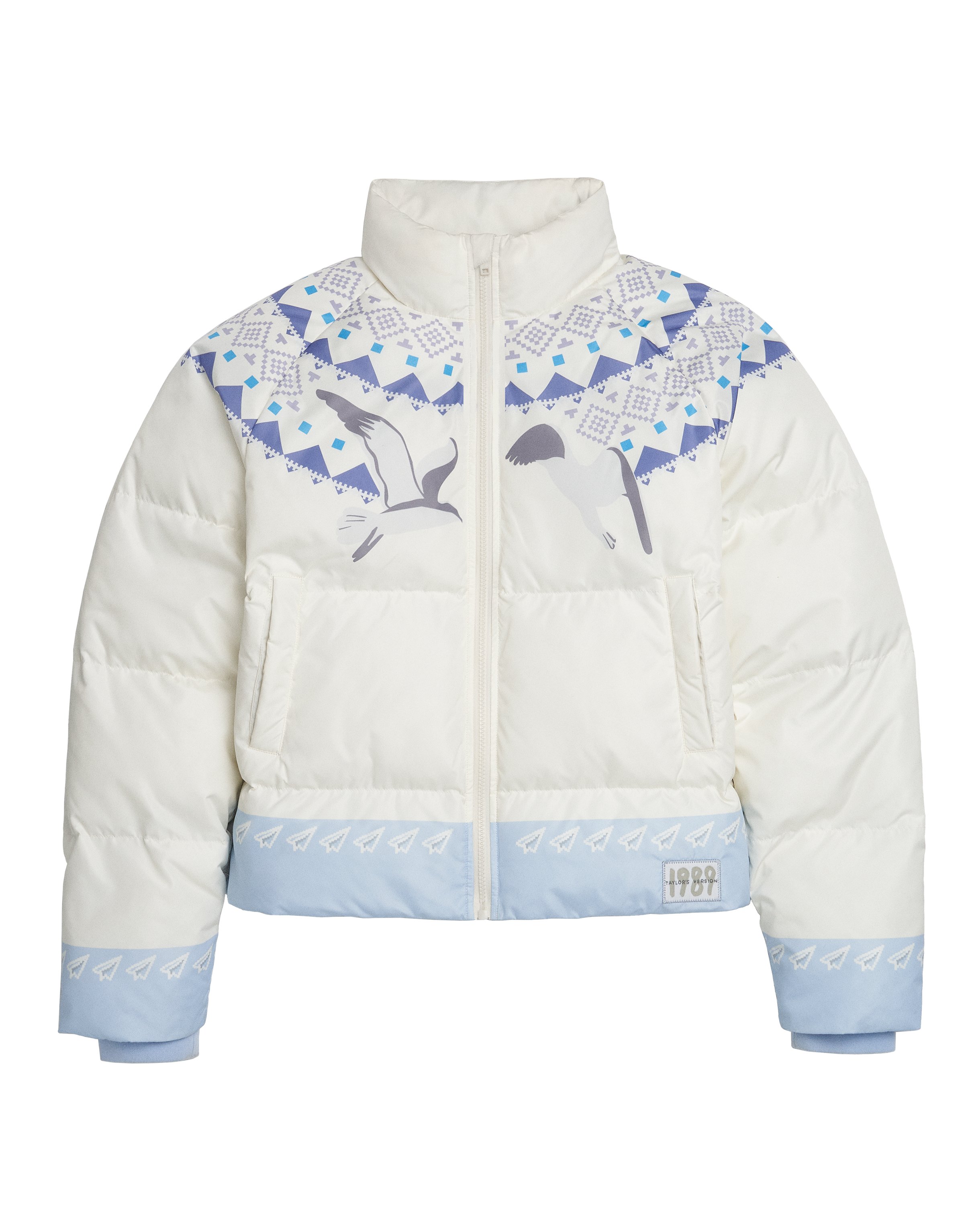 swiftpitch_uk's tweet card. Ships within 10 daysWhite zip up puffer jacket with waist pockets and blue lining featuring retro printed fair isle and seagull design, blue color block with paper airplane design, blue knit cuffs,...