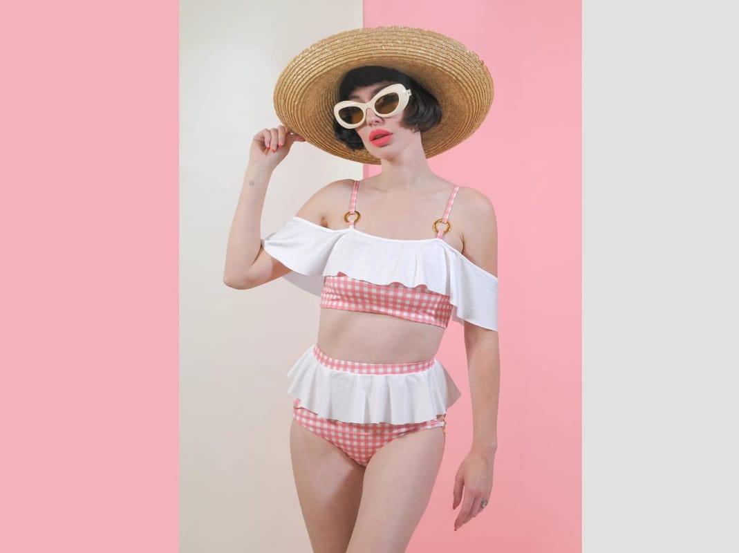 afashionnerd's tweet card. Fashion blogger Amy Roiland, known for her blog A Fashion Nerd, has just launched her first-ever swimwear collaboration
