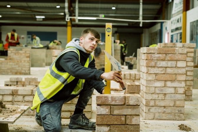 DewsReporter's tweet card. You could give your business a boost with Kirklees College.