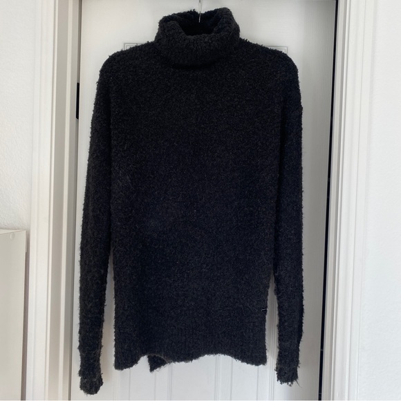 robin_plotnik's tweet card. Sweaty Betty wool turtleneck, size small