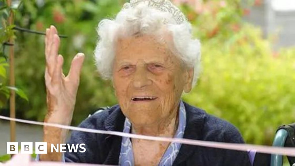AgingBiology's tweet card. Ethel Caterham, who lives in Lightwater in Surrey, is 115 and 252 days.