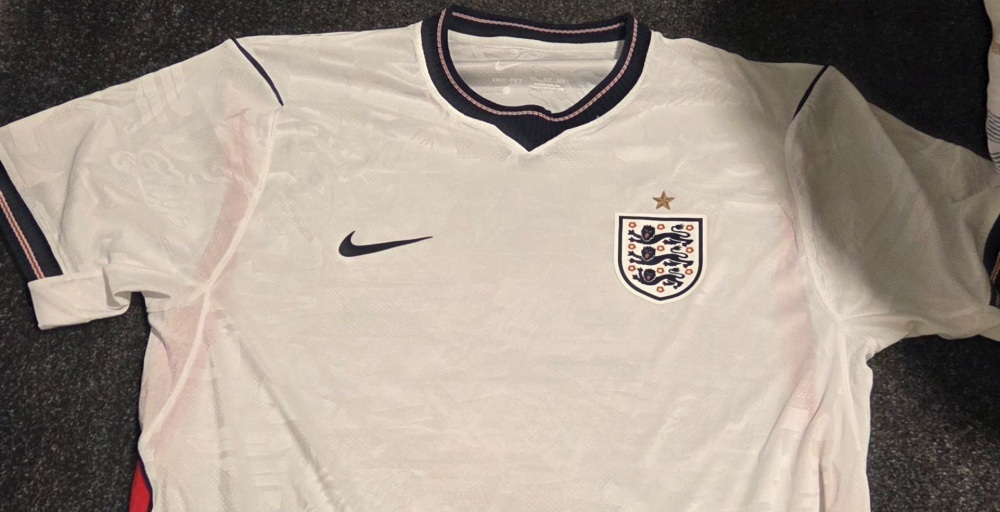 Footy_Headlines's tweet card. Update: @Brotonswfc has leaked another new image of England’s 2026 home kit.
