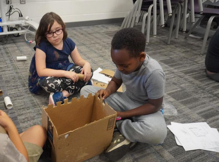 WolvesWps's tweet card. Fourth-graders built cardboard castles harkening back to the days of yore when kings and queens ruled, knights battled and merchants sold their wares.