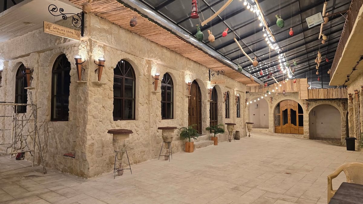 AssyriaPost's tweet card. After decades of decline and a multi-year restoration effort, Alqosh’s historic bazaar is preparing to welcome visitors once again.