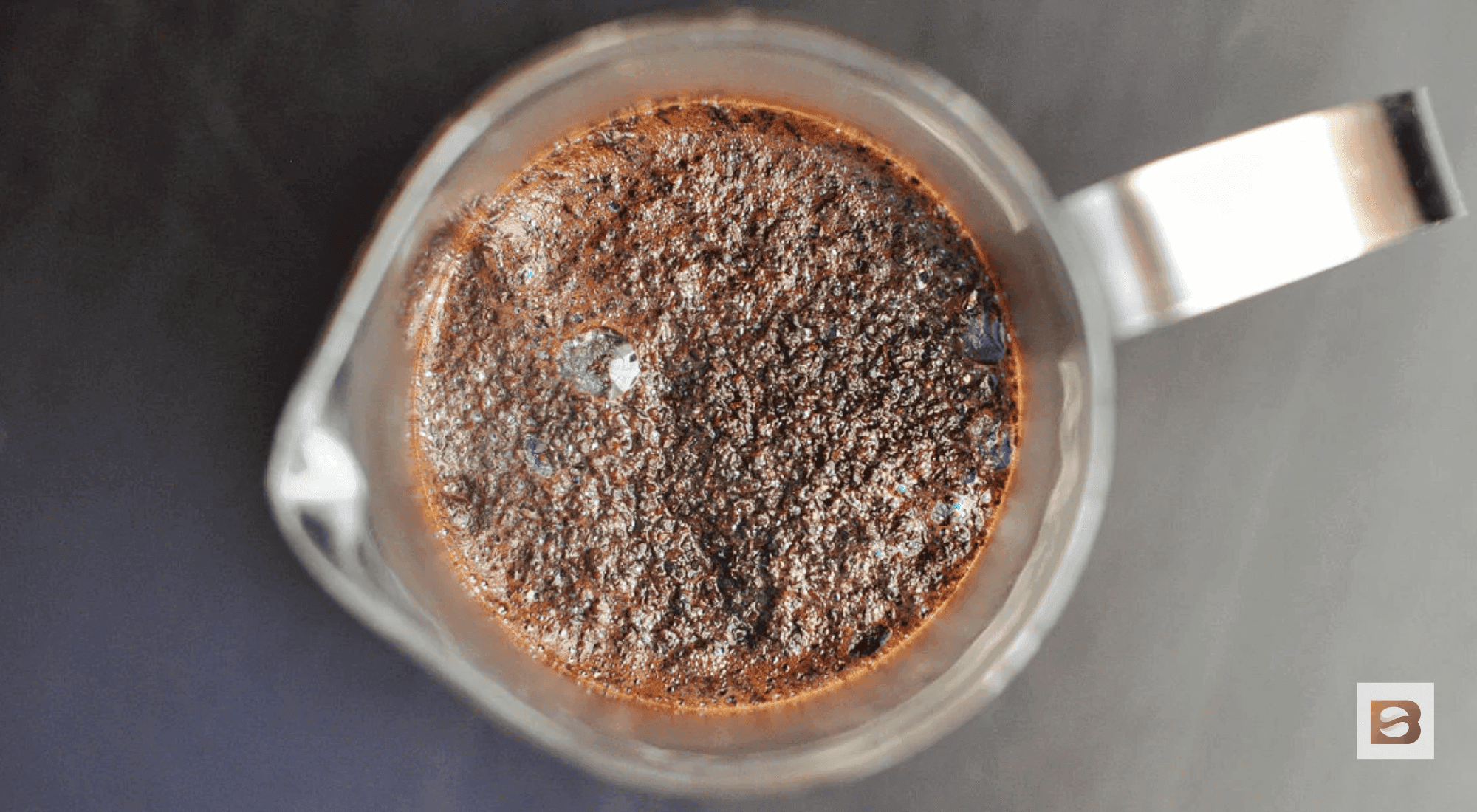BeanGroundBlog's tweet card. Tired of grainy French press coffee? Learn why sediment ends up in your cup and discover simple fixes to brew smoother, grit-free French press coffee at home.