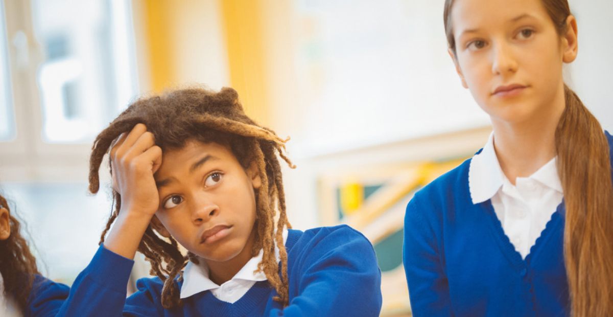 CarersTrust's tweet card. Young carers miss 23 days of school each year! Discover shocking new findings from Carers Trust's 2024 education report.