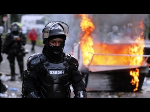 YourAnonCentral's tweet card. How Police Are Terrorizing Colombia