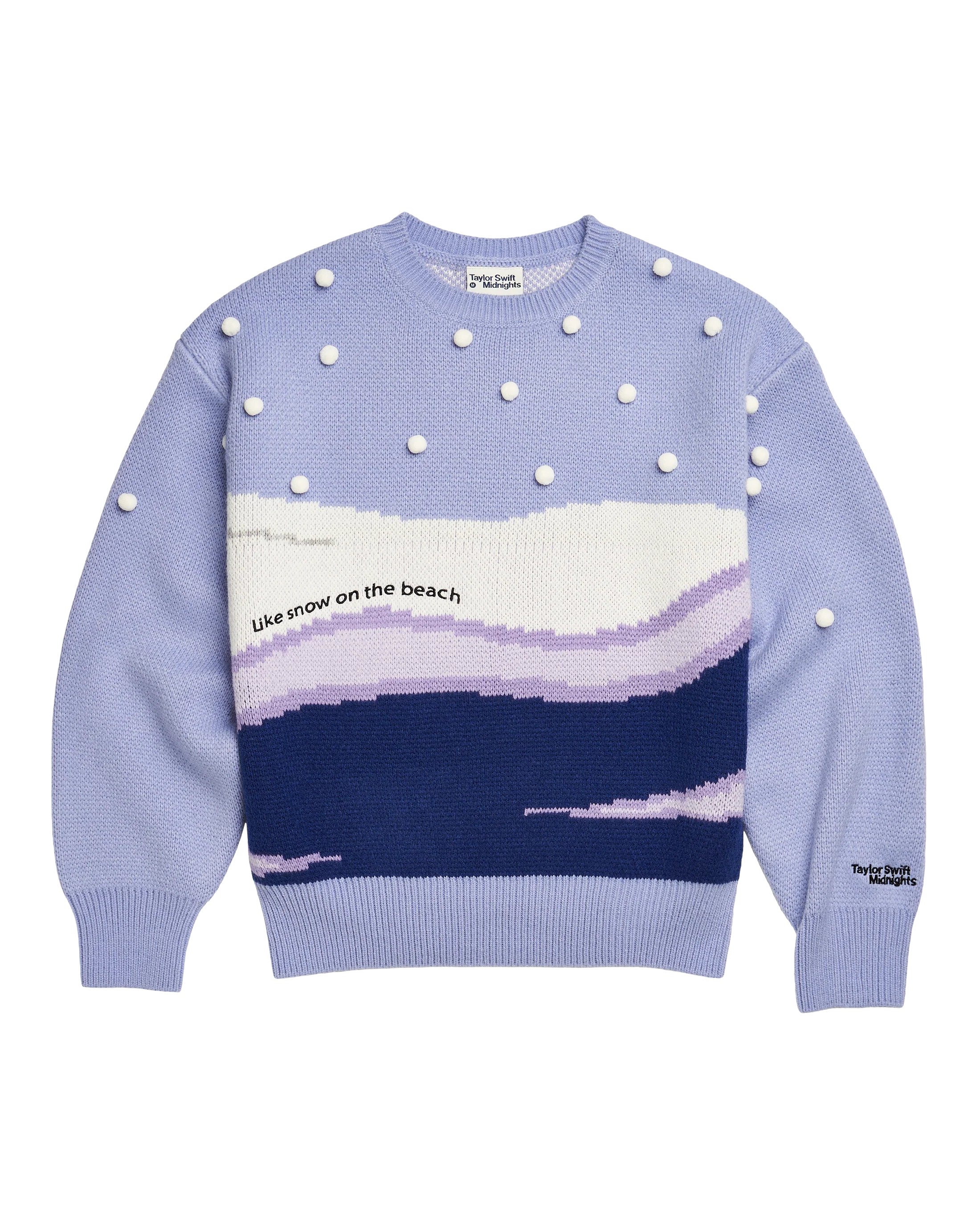 swiftpitch_uk's tweet card. Ships within 10 daysPurple, lavender, midnight blue, and white knit sweater featuring "Like snow on the beach" song lyrics embroidered on front and "Taylor Swift Midnights" embroidered on wearer's...