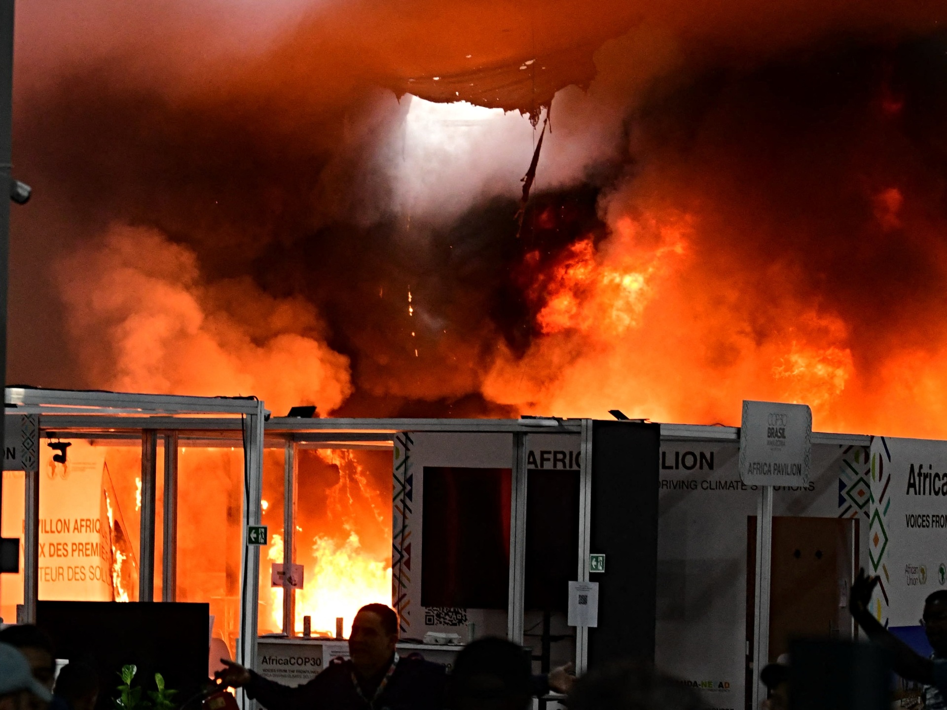 sunsimonkent's tweet card. The U.N. climate talks COP30 were hastily evacuated Thursday due to a fire breaking out inside the venue in Belém, Brazil, with smoke, flames, and a rise in temperature engulfing the stricken area.