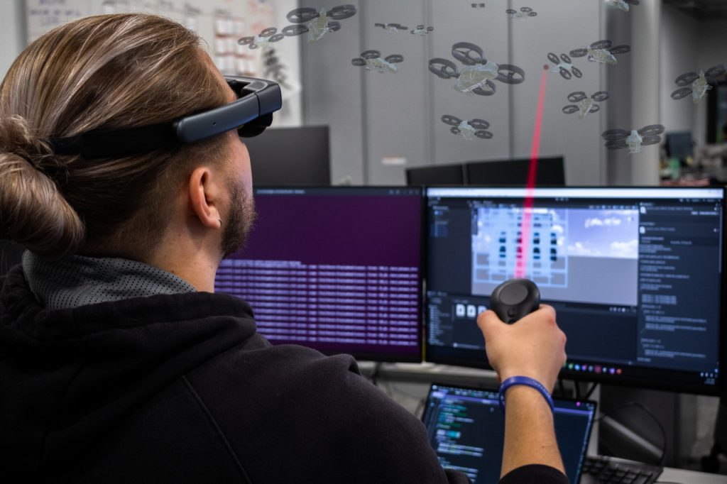 CHCI_VT's tweet card. Two Virginia Tech researchers are a part of a multi-institution Defense Advanced Research Projects Agency program to improve the security of the U.S. military in mixed-reality environments.