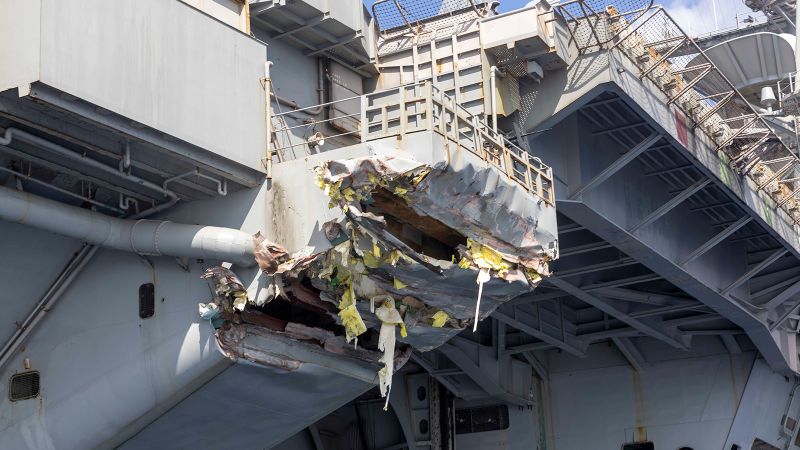 thekarmikbob's tweet card. New photos show the damage a US Navy aircraft carrier sustained in a collision with a merchant ship last week.